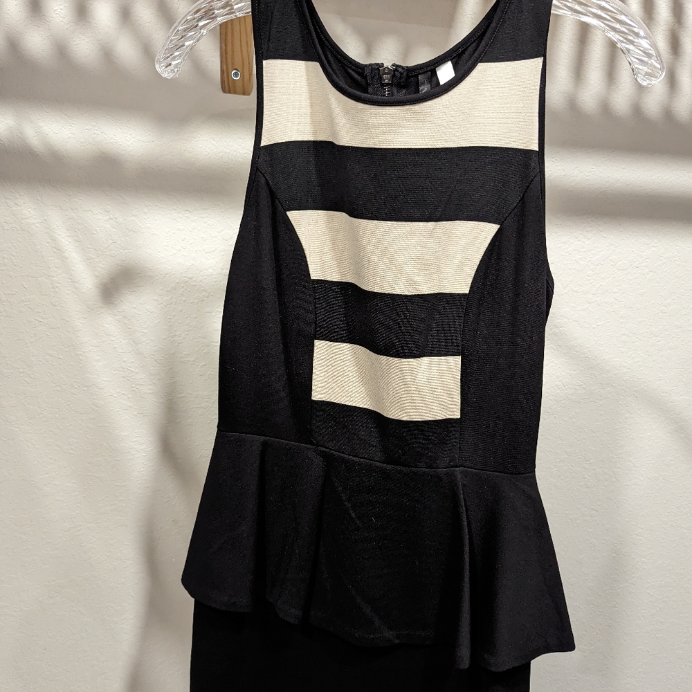 Sleeveless black and tan dress